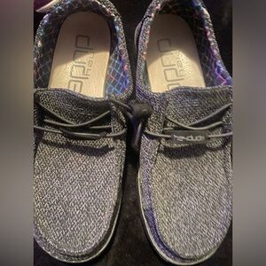 Hey Dudes size 7. Only worn twice. No stains. Like new condition.